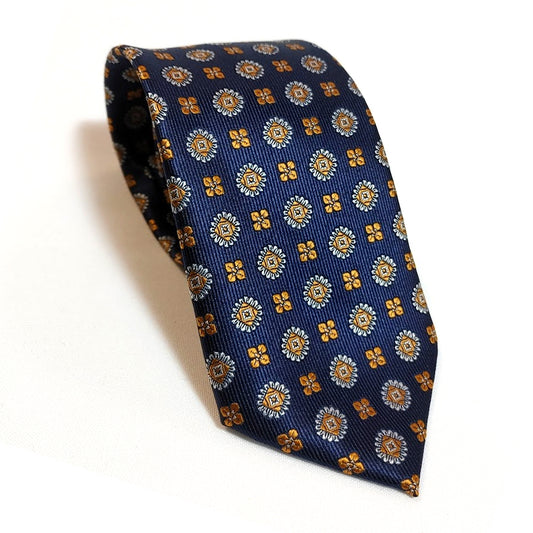 CORBATA CON MEDALLONES